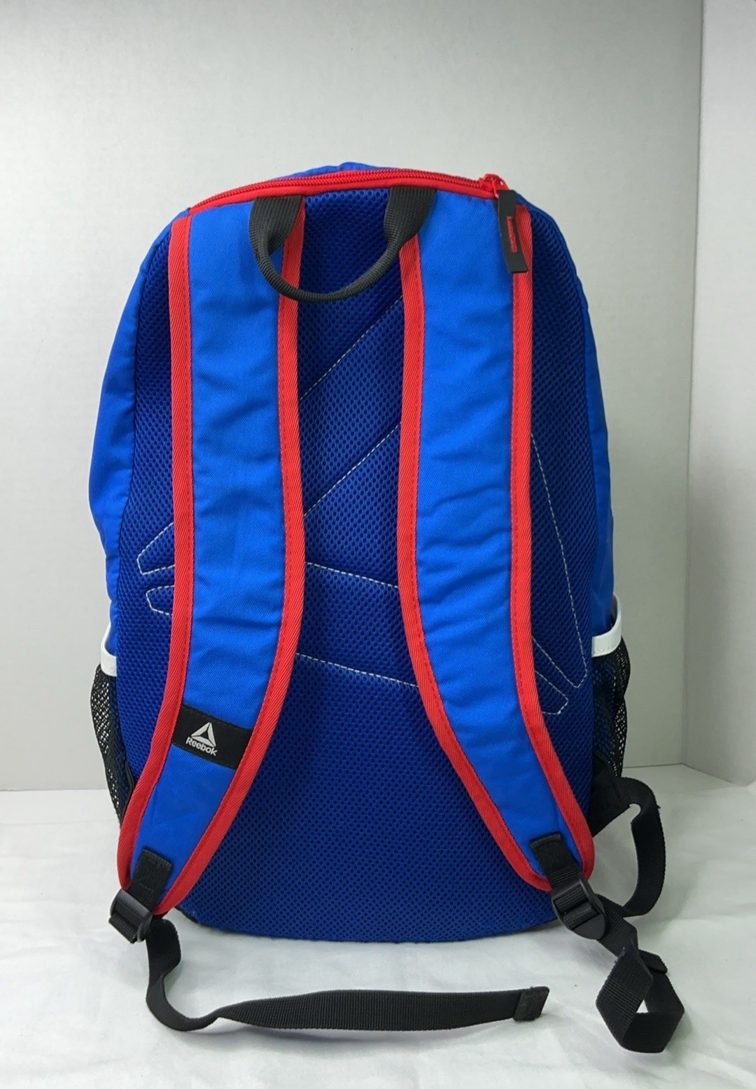 Reebok Red Blue Black Backpack Zip Closure Adjustable Strap Padded Inner Pockets