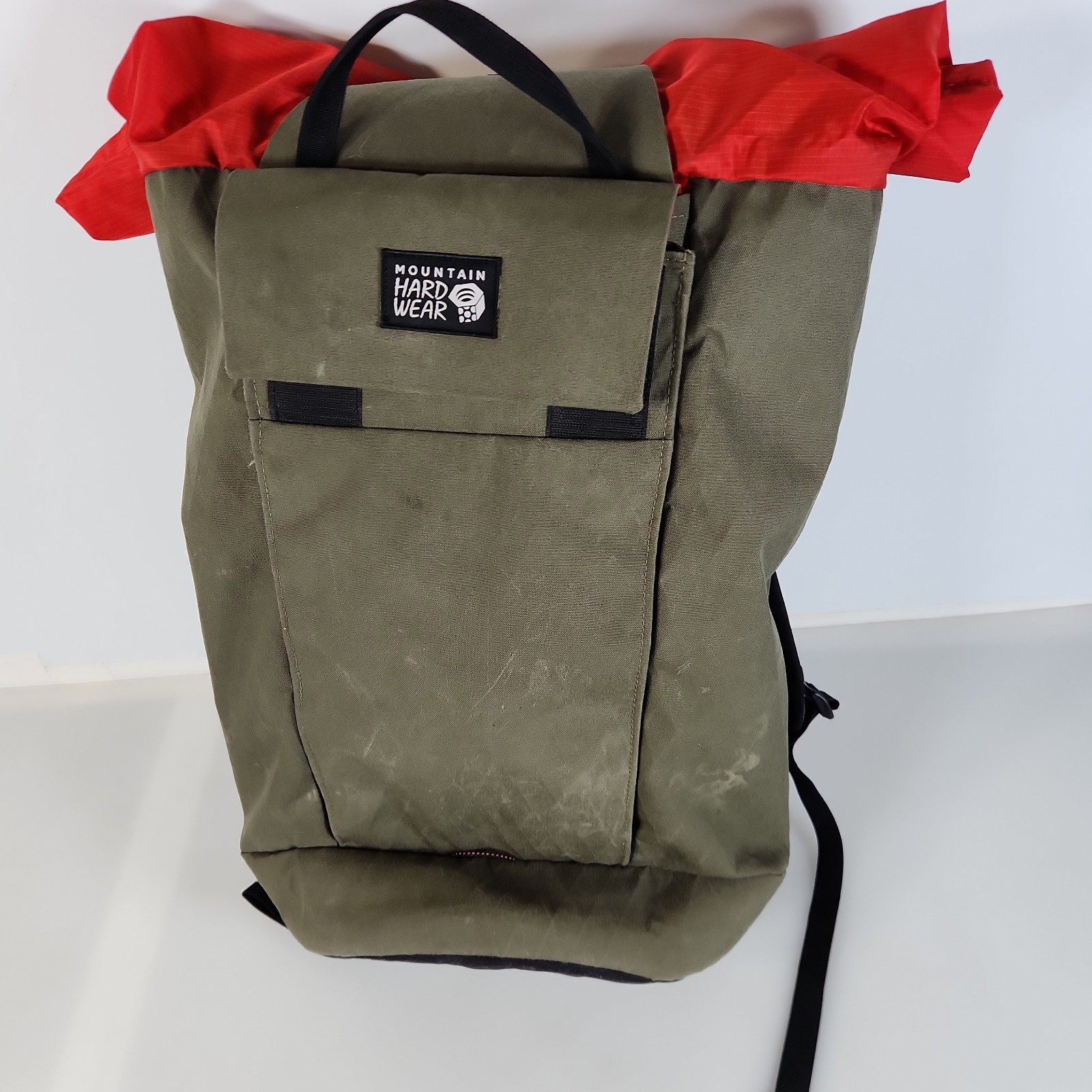 Mountain Hardwear Grotto backpack olive green and bright red colorway 20x12x7