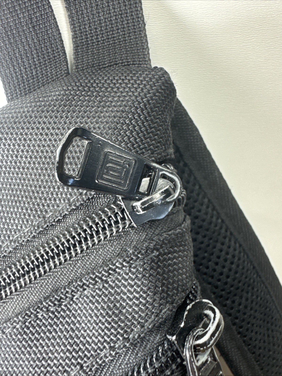 FUL One Shoulder Sling Backpack/Bag with adjustable strap in Black