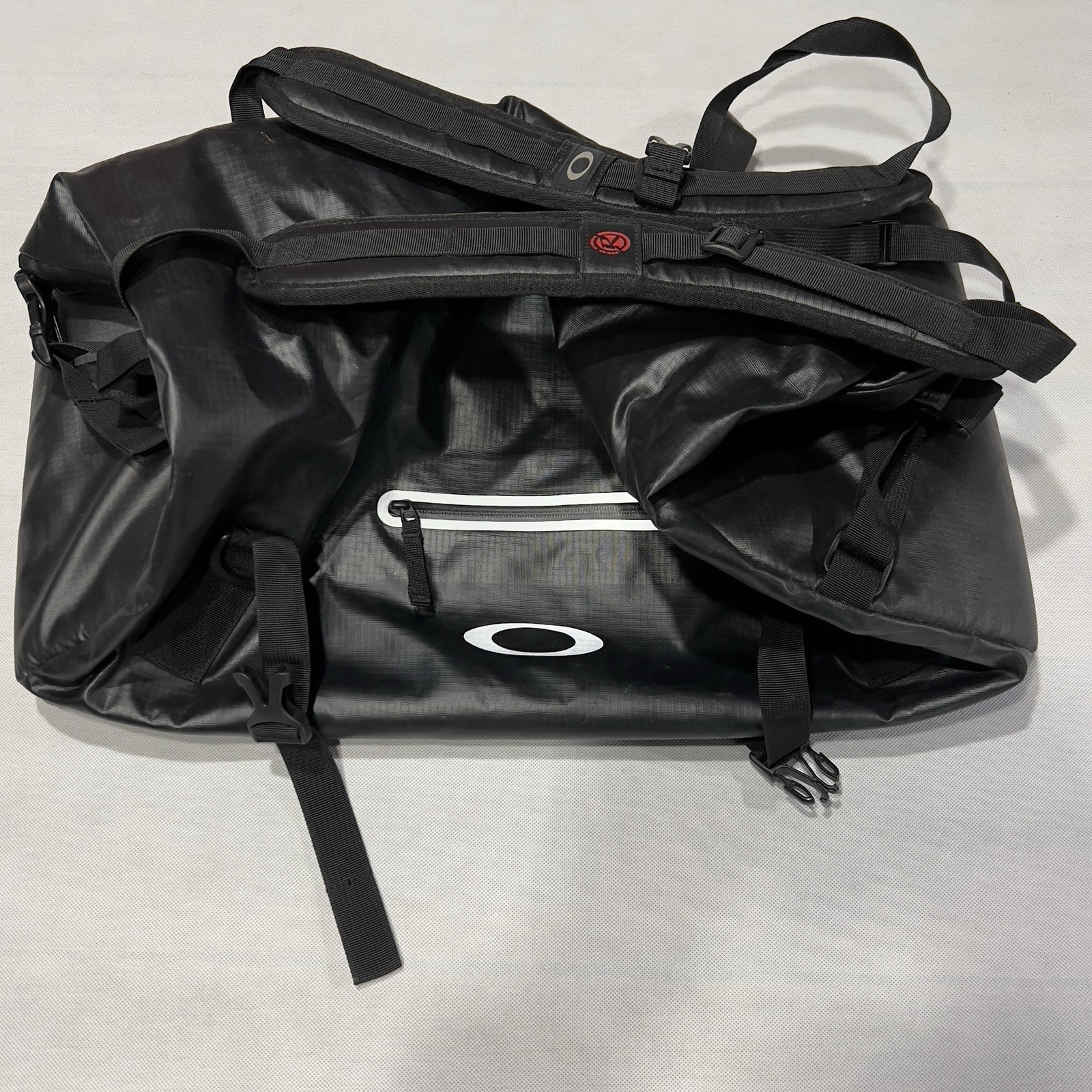 Oakley Motion 42L Factory Pilot Bag Blackout Roll Top Carry Case Backpack