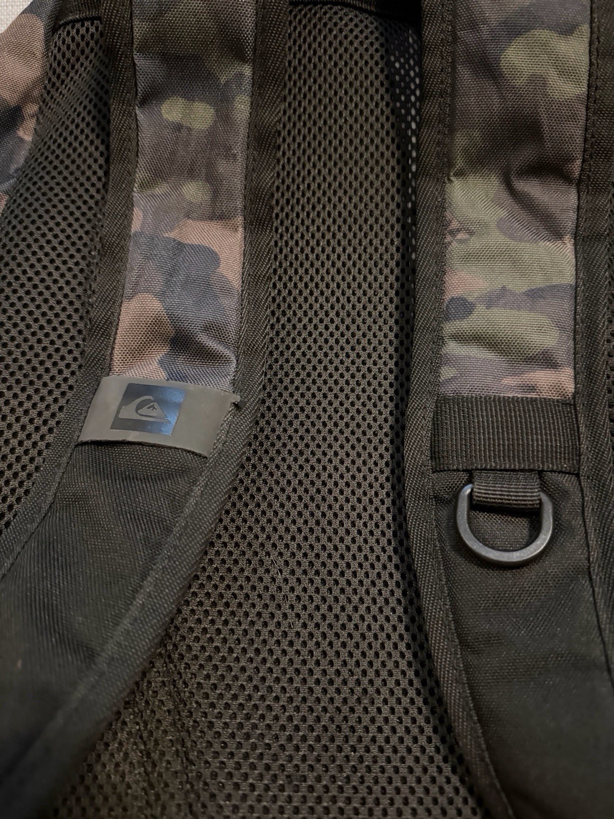 Quiksilver camo backpack with multiple compartments and zippers Back To School