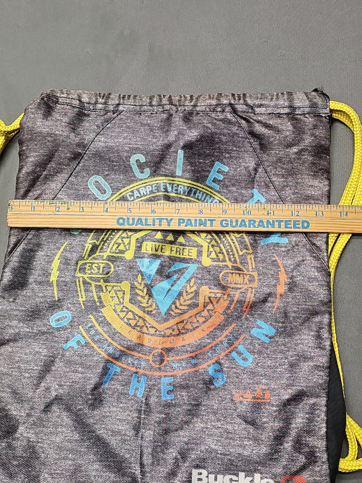 Buckle Drawstring Backpack “Society Of The Sun”