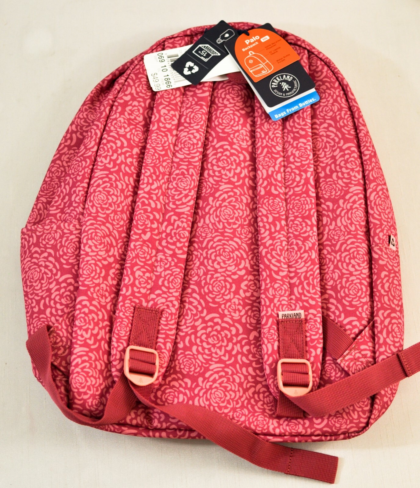 Palo backpack numerous pockets cushion straps laptop sleeve pink floral