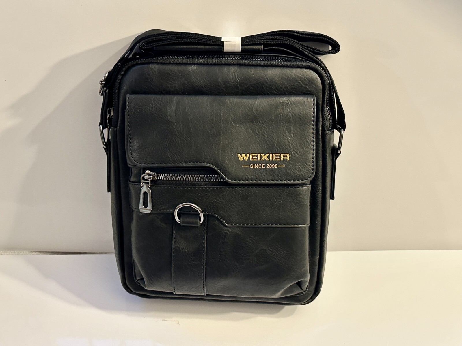 Mens/Womens black PU Leather Crossbody/Shoulder Bag. Large capacity.
