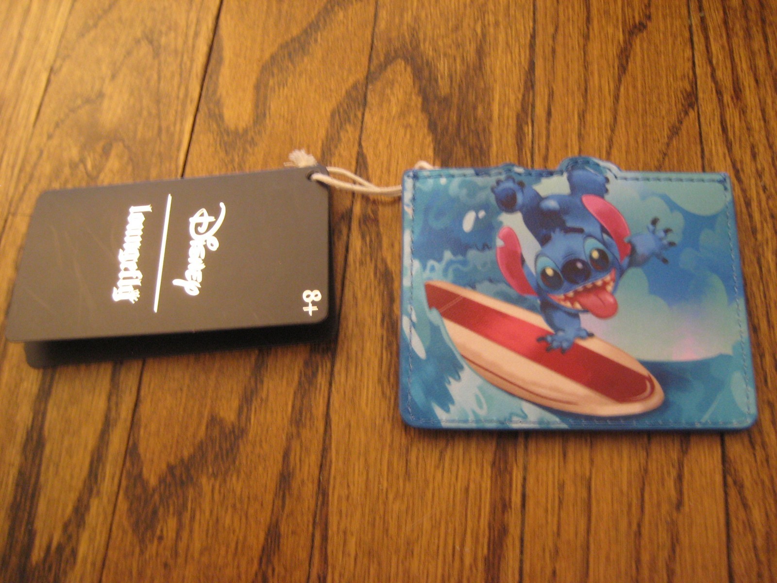 Loungefly Disney Lilo and Stitch Spinning Stitch Surfer Mini Backpack/Card Hold