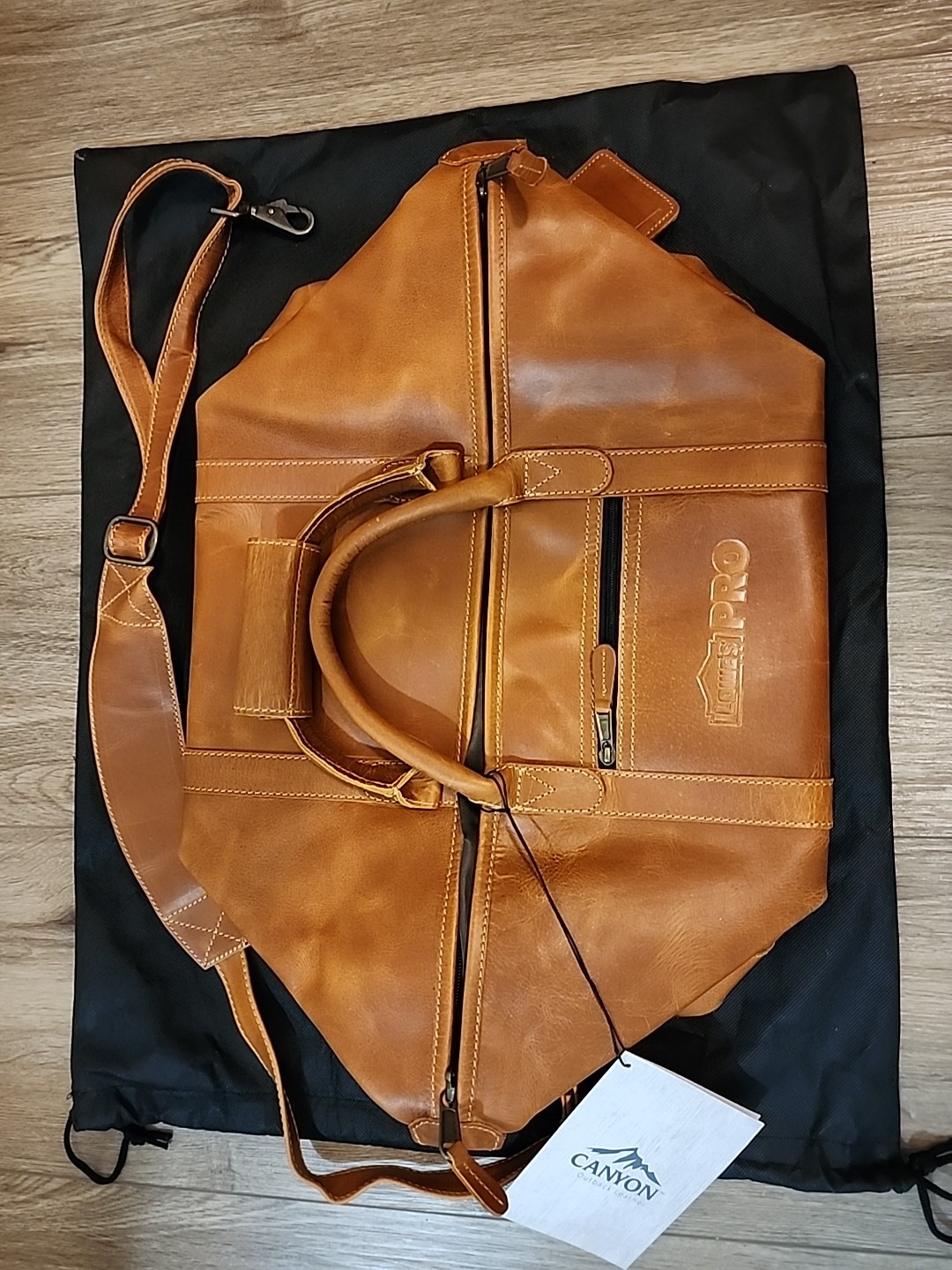 Canyon Outback Leather Brown Duffle Bag Zip Closure Double Handles Bottom Studs