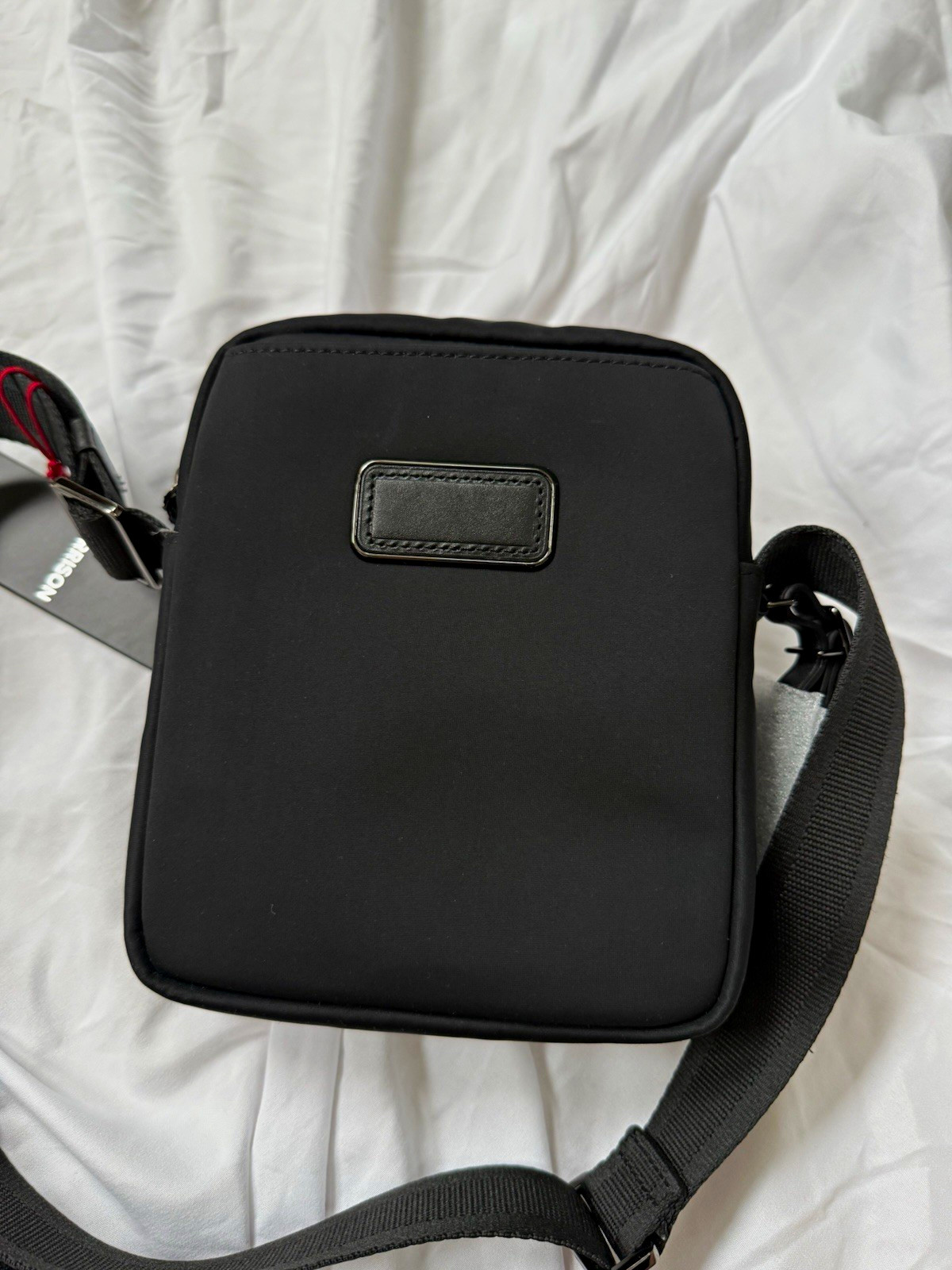 Tumi Harrison Small Crossbody Bag Black Zip Adjustable Strap Inner Pockets