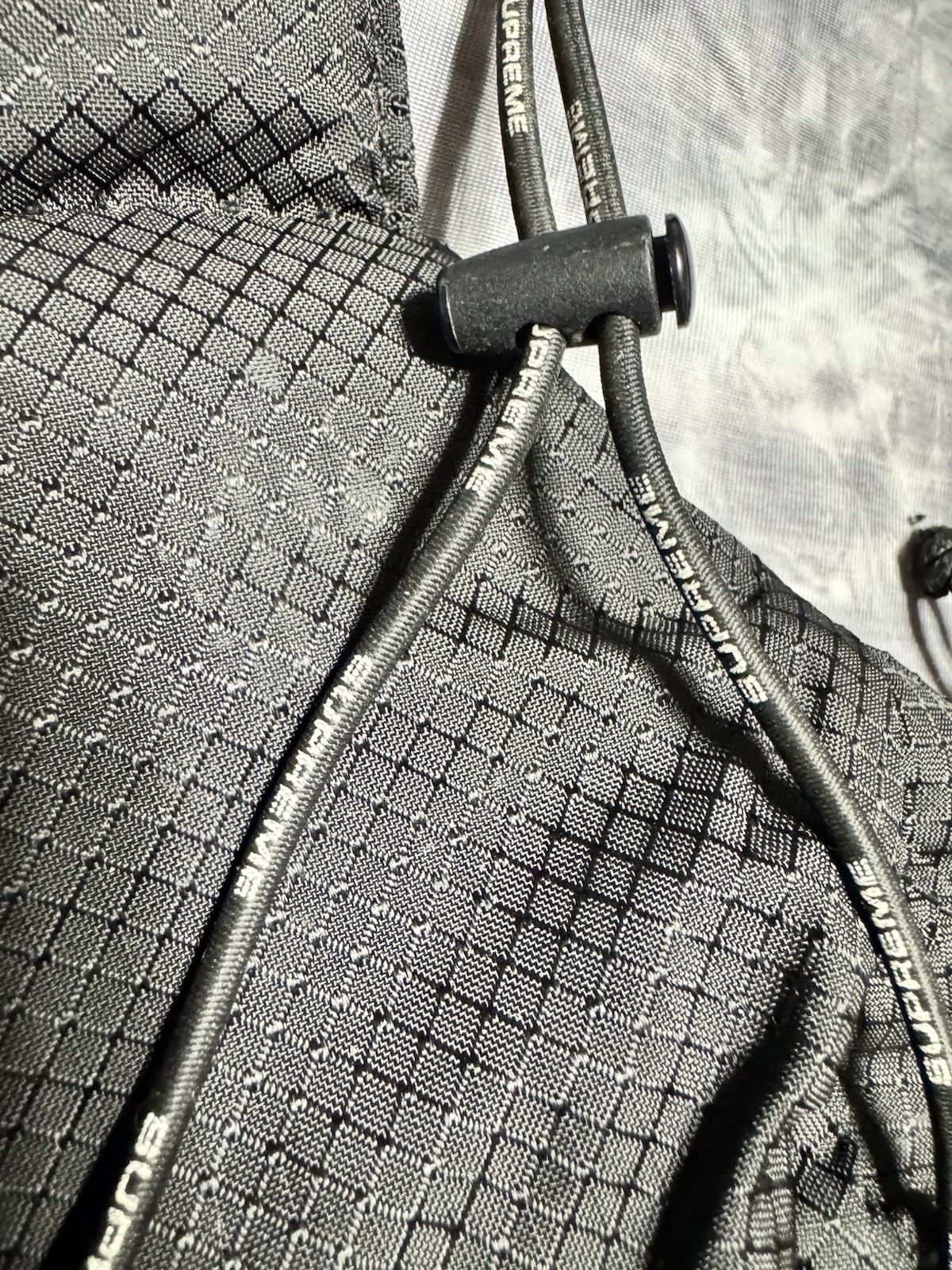Supreme Sling Bag Black SS22, Adjustable Crossbody Sling Bag, Zippered Pockets.