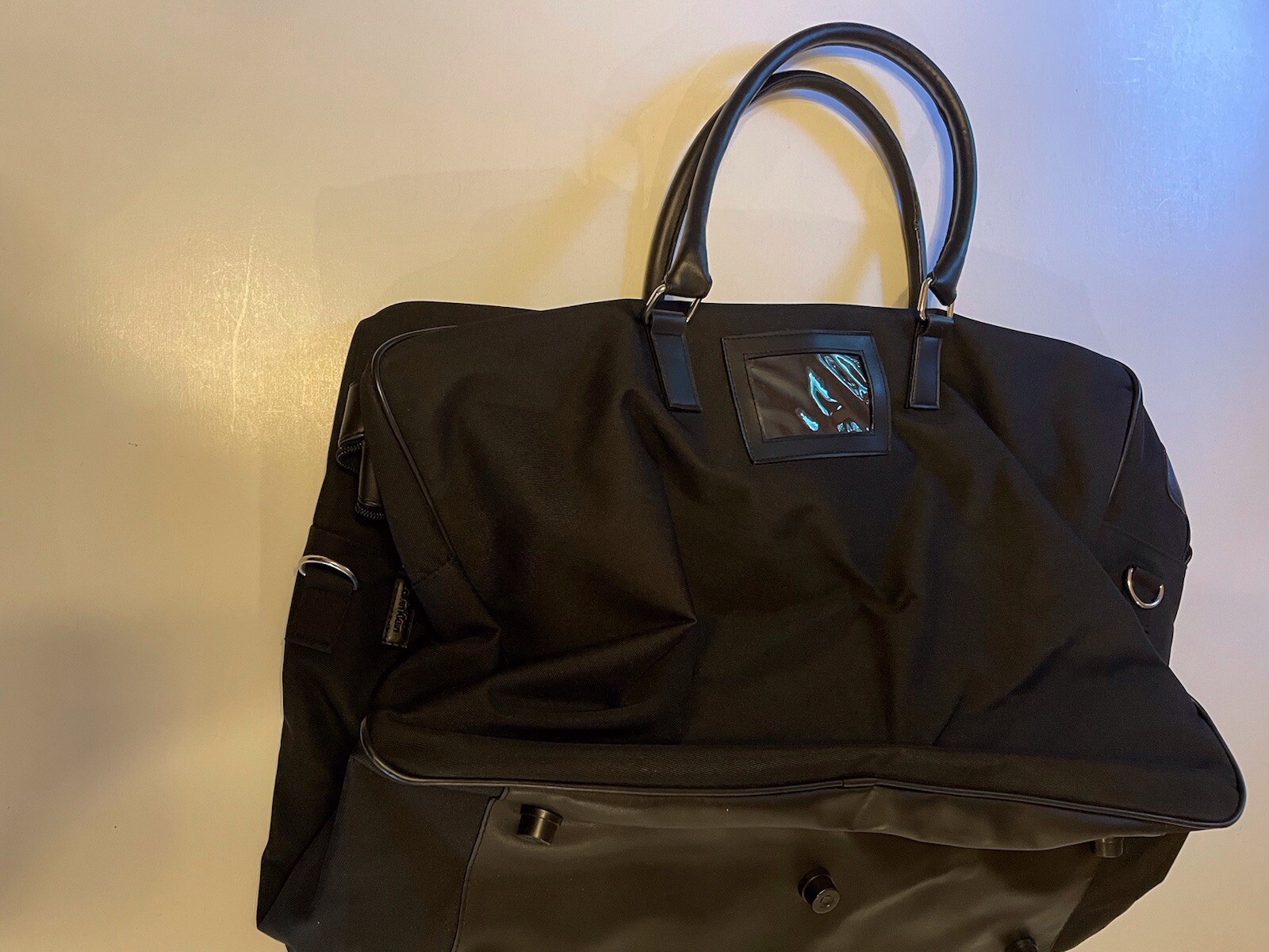 Calvin Klein 100% Polyester travel duffle bag black, shoulder strap, And Handles