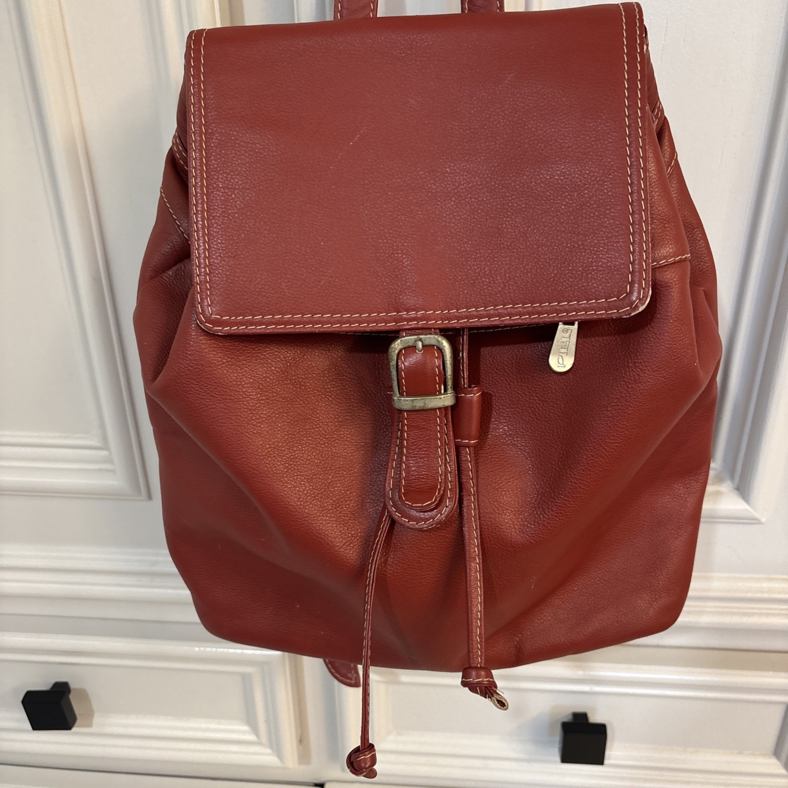 Piel Genuine Leather Red Backpack Purse With Straps Buckle Snap Closure.