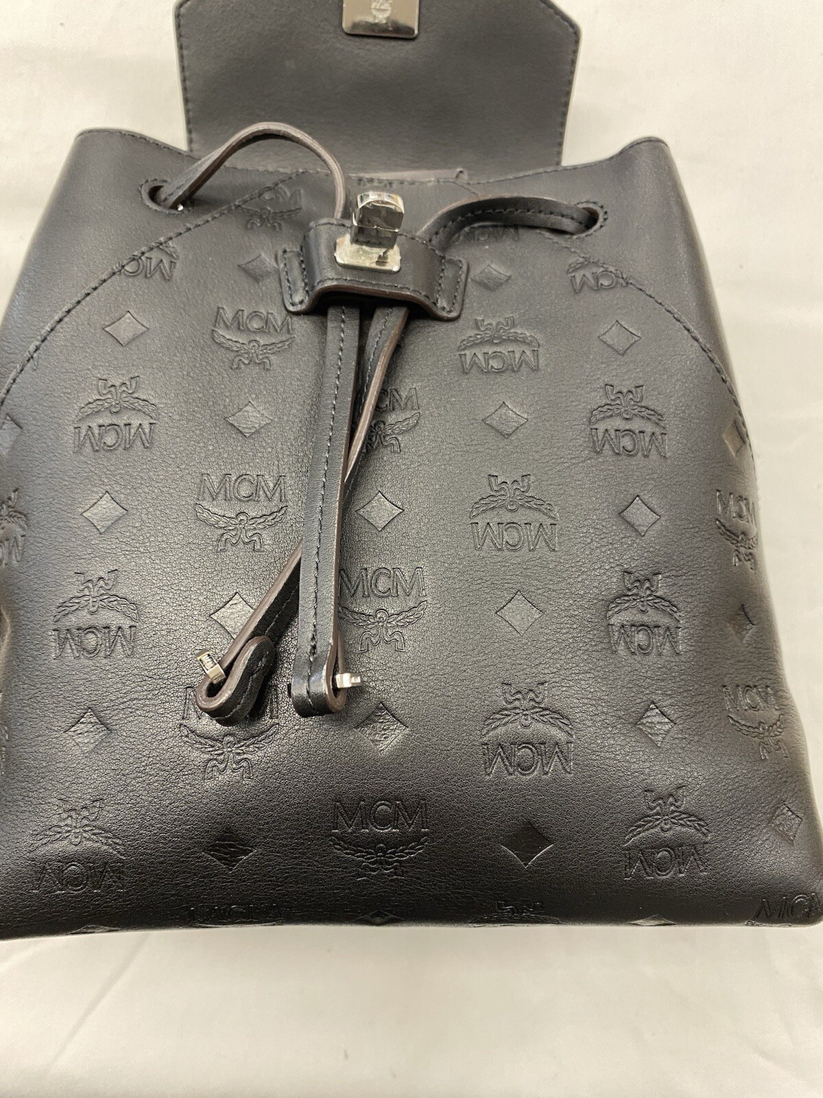 MCM Essential Monogram Leather Small Backpack In Charcoal 10×8.5×4.5 Dark Brown