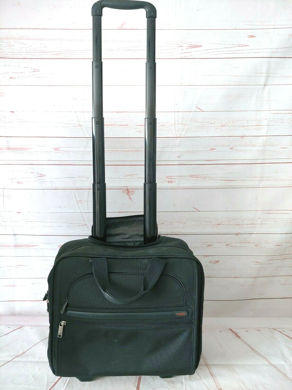 TUMI Black Wheeled Rolling Briefcase/Carry on Bag 15X13X6 Inches