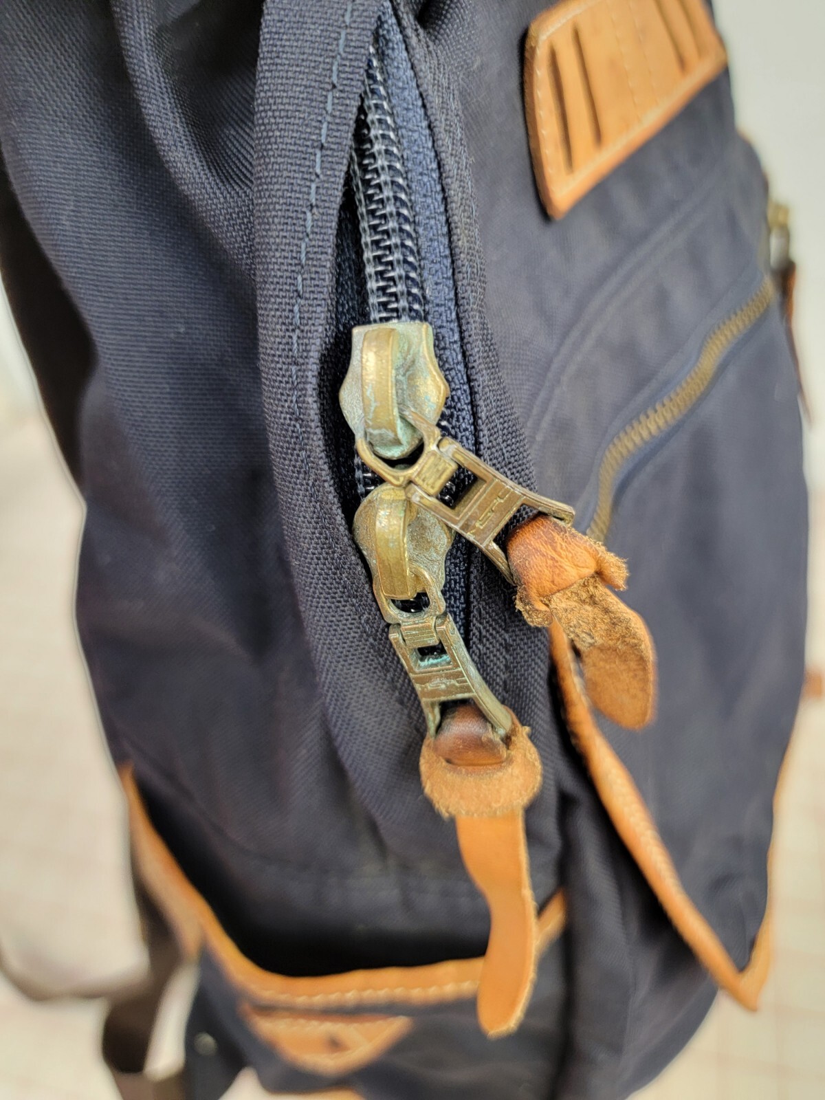 Master-Piece Backpack – Made in Japan Navy & Tan Leather.