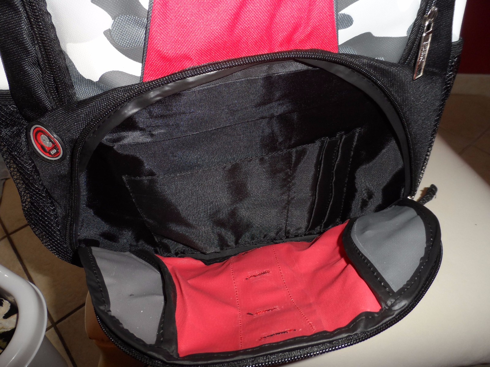 red, gray and black chamo print backpack from Prosport