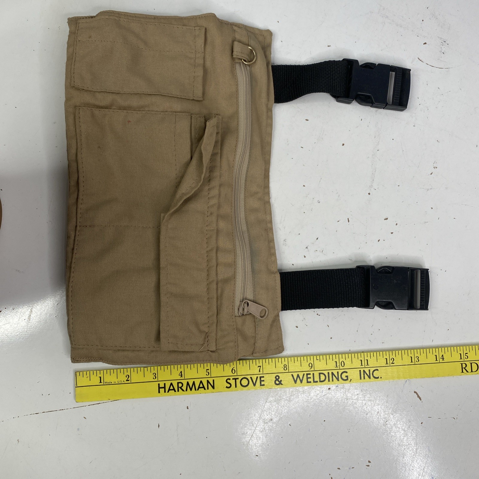 Orvis hanging accessory bag with plastic buckles insulated hand warmer pockets