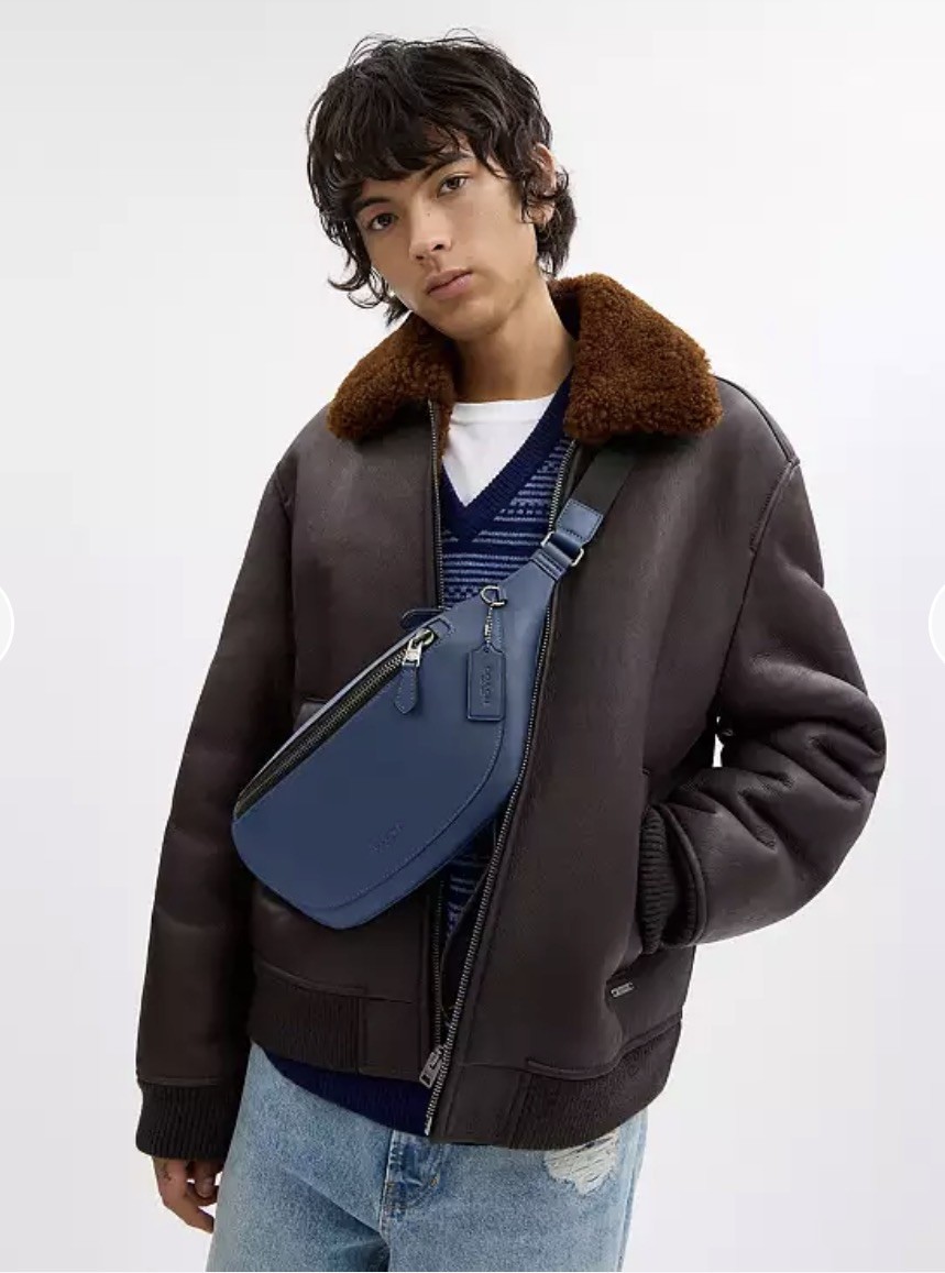 New COACH Outlet Warren Belt Bag in deep blue leather.