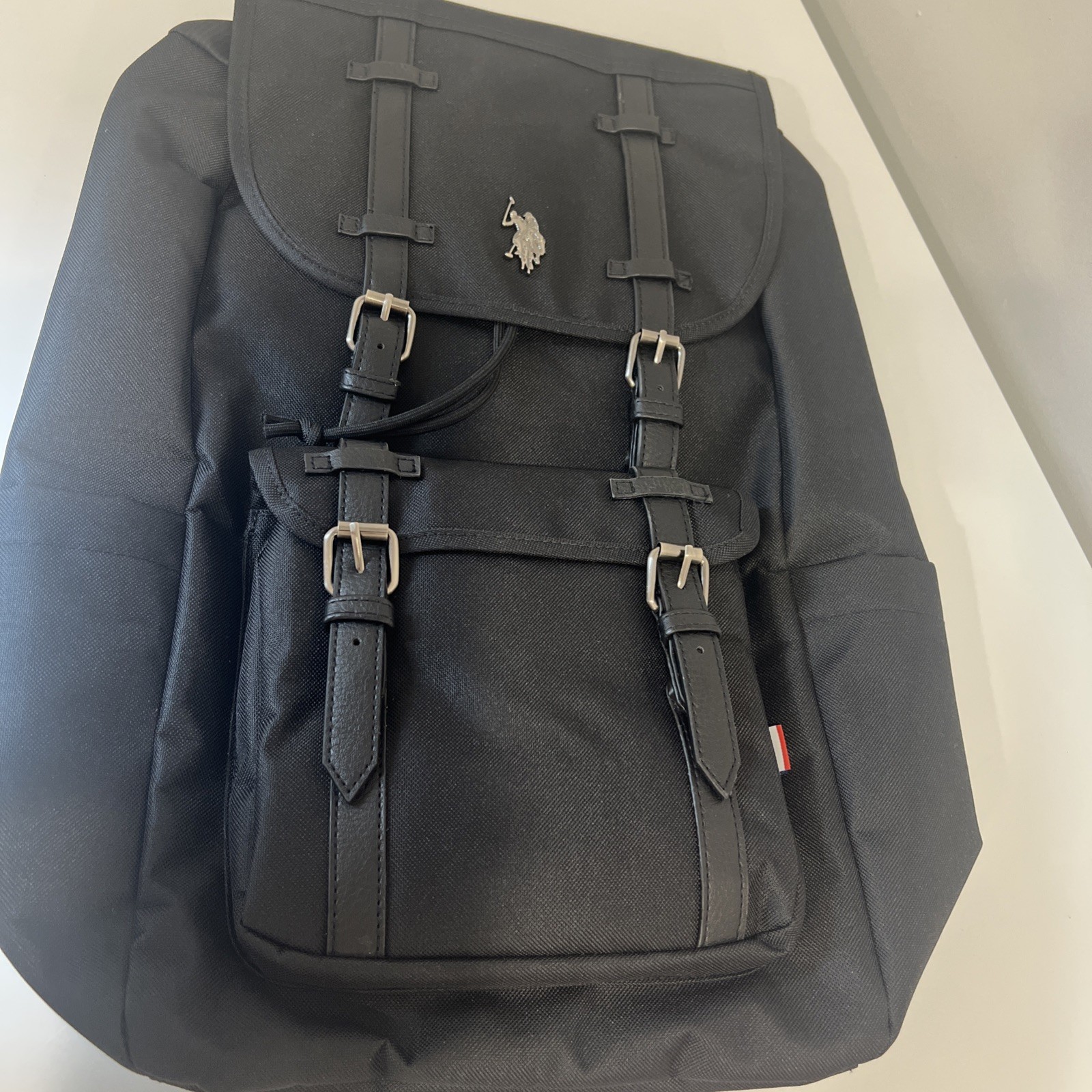 U.S. Polo Assn Black Flap Backpack Top Loader Travel Bag Unisex NEW