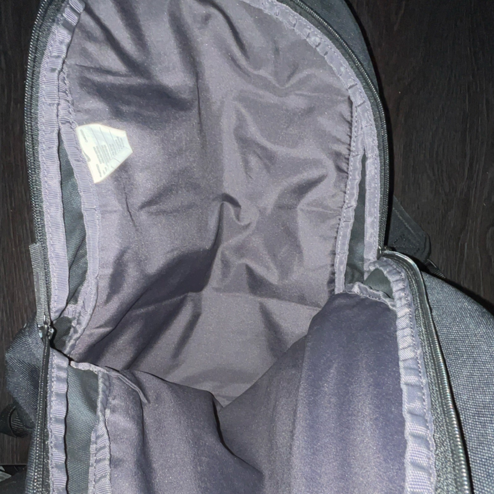 Nike Black Zip Backpack for Men, Padded, Outer Pockets, Sports Logo