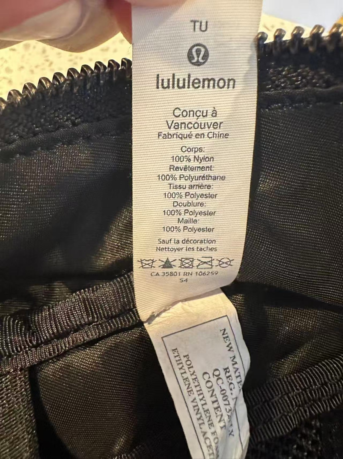 Black Lululemon City Adventurer backpack,iconic metal logo and waterproof fabric