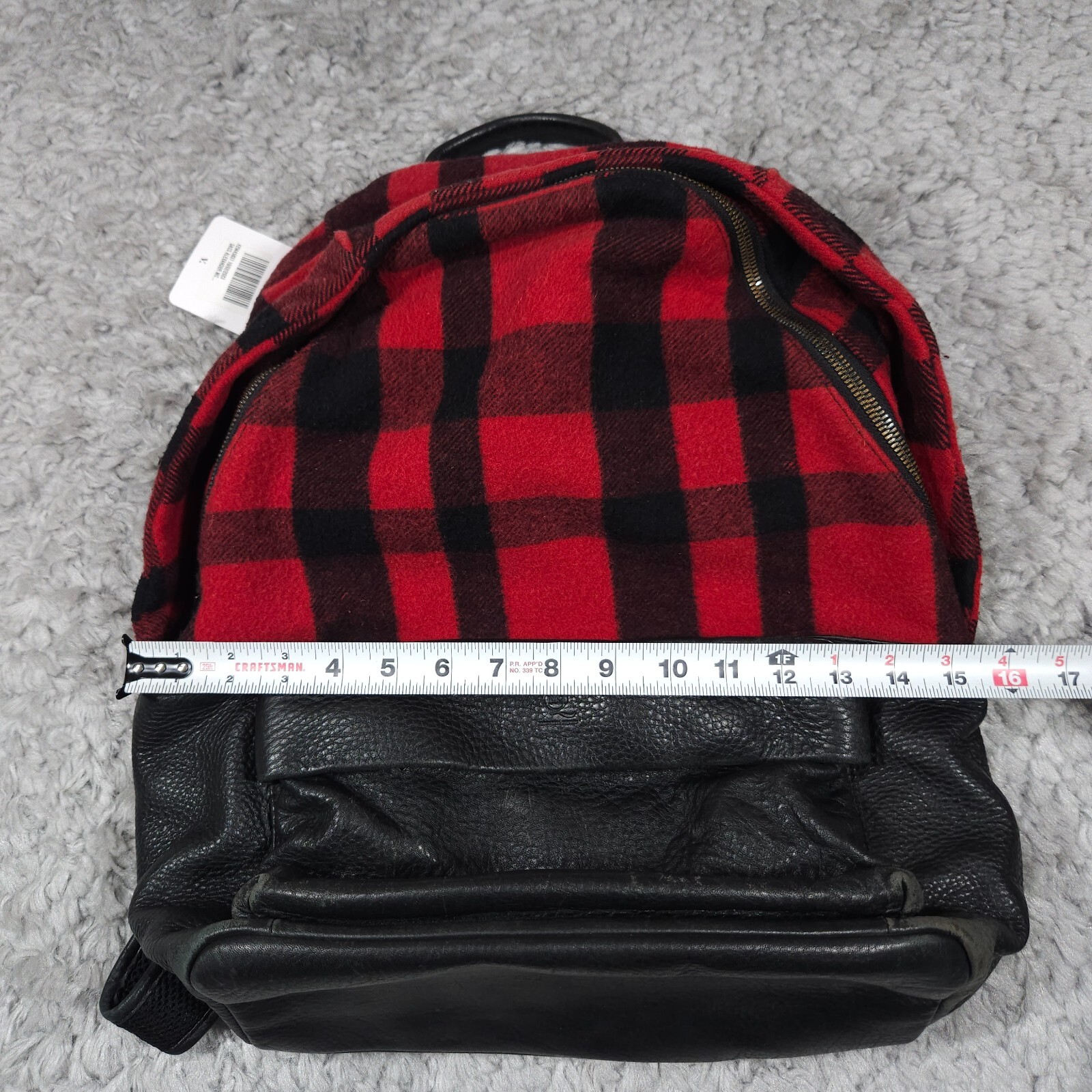 READ Mcq by Alexander Mcqueen Red Black Buffalo Plaid Wool Leather Backpack