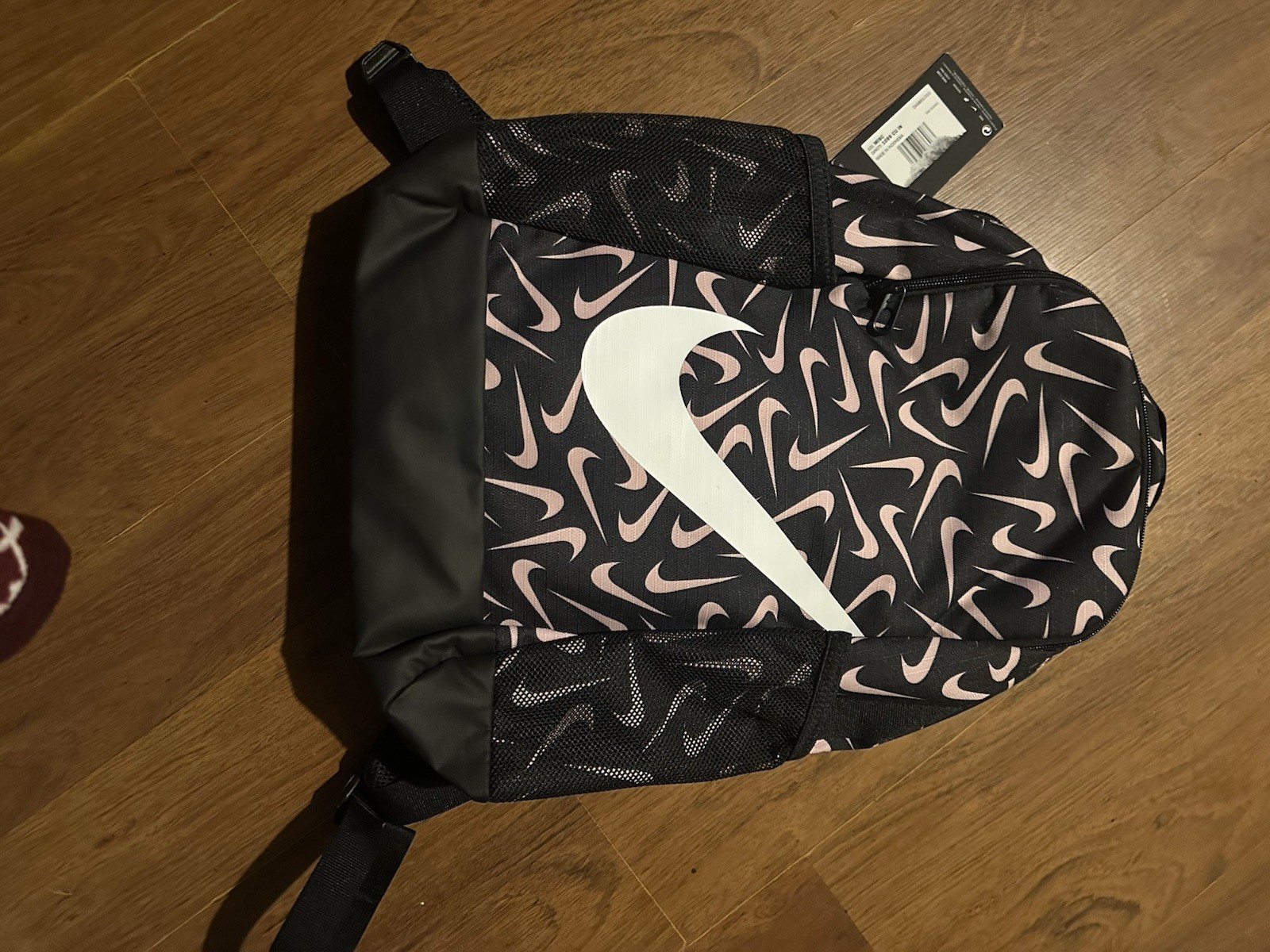 Nike Backpack Pink And Black with the White Swoosh