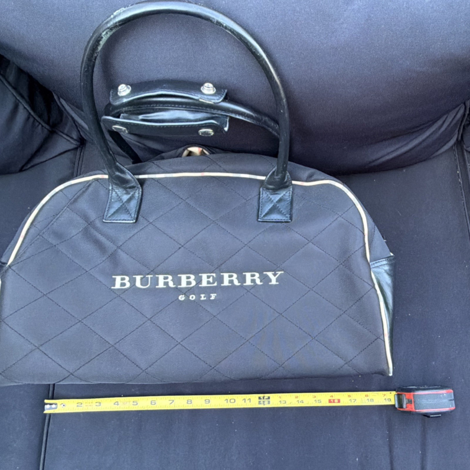 Burberry Duffle Bag Black Leather Handles Checkered Pattern Inner Pockets Large