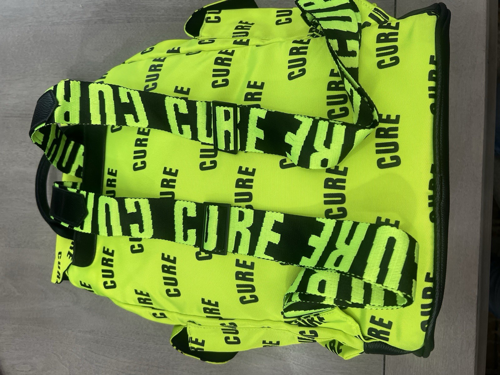 Green/Black CURE Logo Print Backpack Drawstring Buckle Adjustable Straps