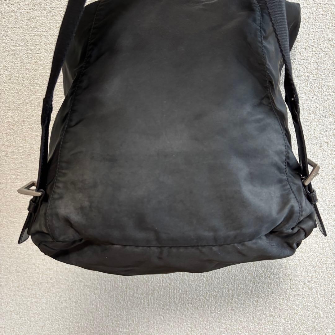 Prada Rucks Saffiano Triangular Plate