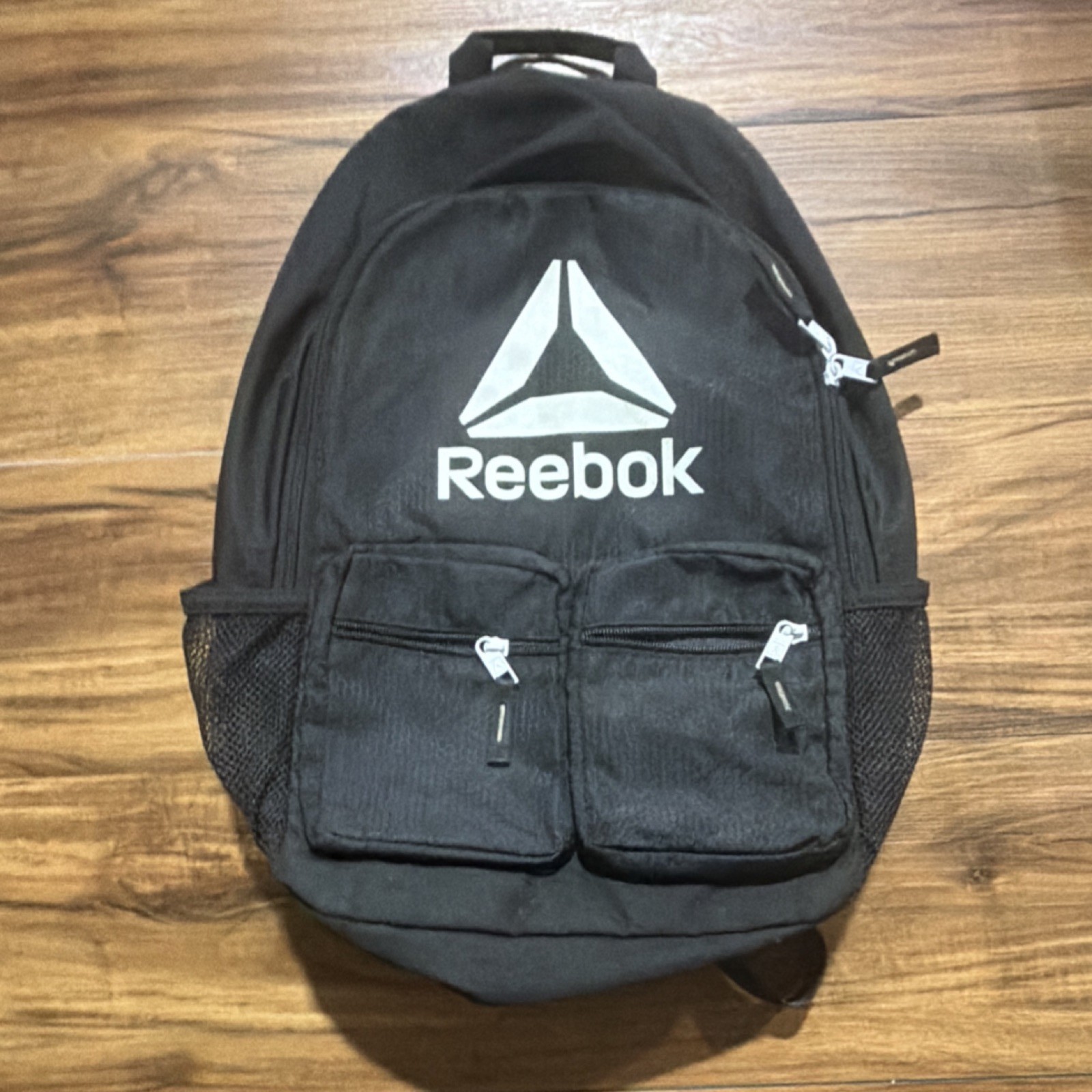 Reebok Black Backpack, Adjustable Strap, Lightweight, Zip Closure, Sports Theme