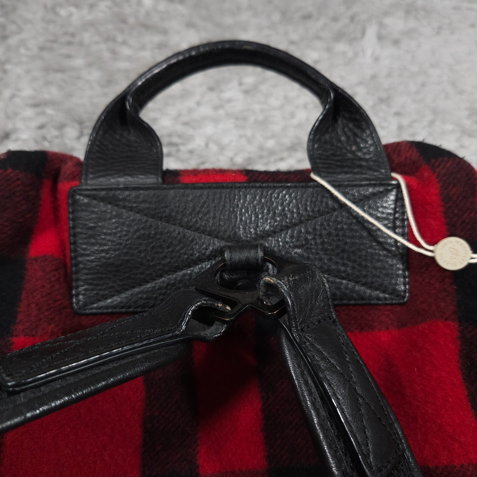 READ Mcq by Alexander Mcqueen Red Black Buffalo Plaid Wool Leather Backpack