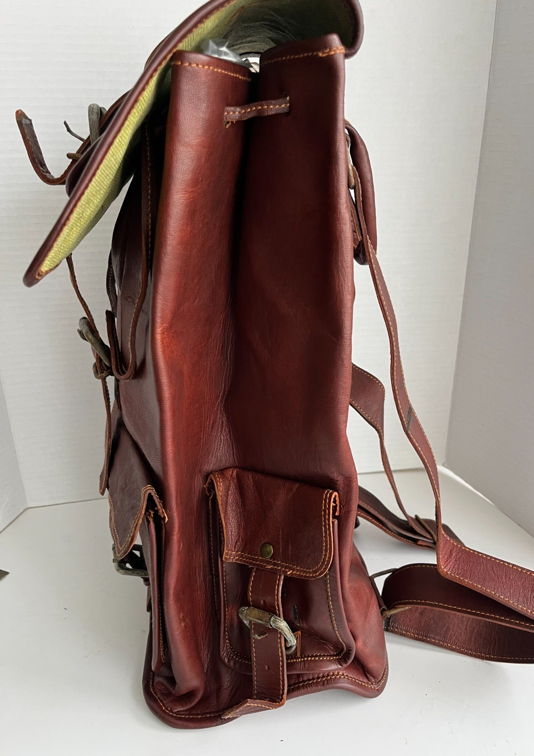 Brown Leather Rucksack Backpack with Drawstring, Flap & Buckle Closure (India)
