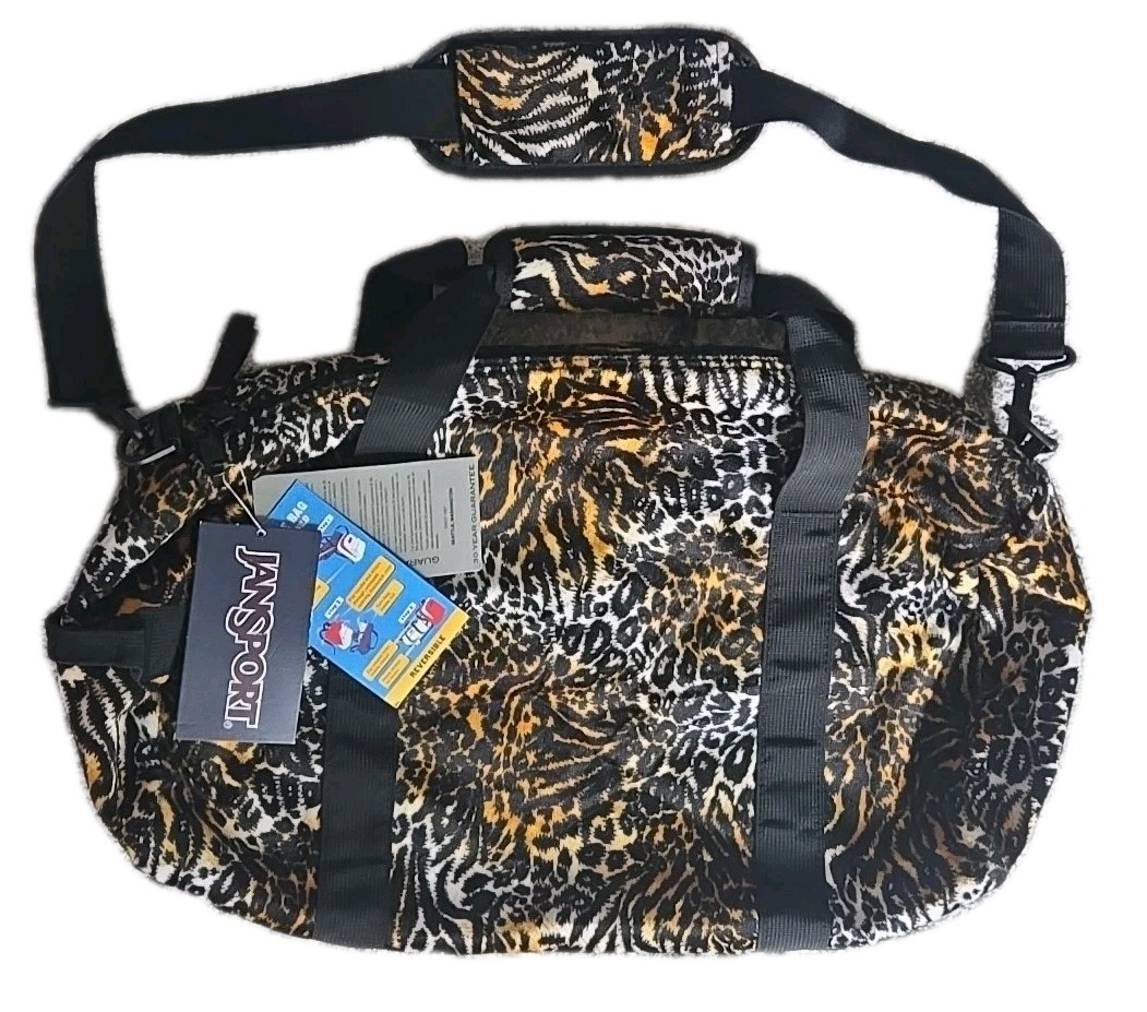 NWTs Jansport Inner Beast Reversible Duffel White Brown Tiger / Red