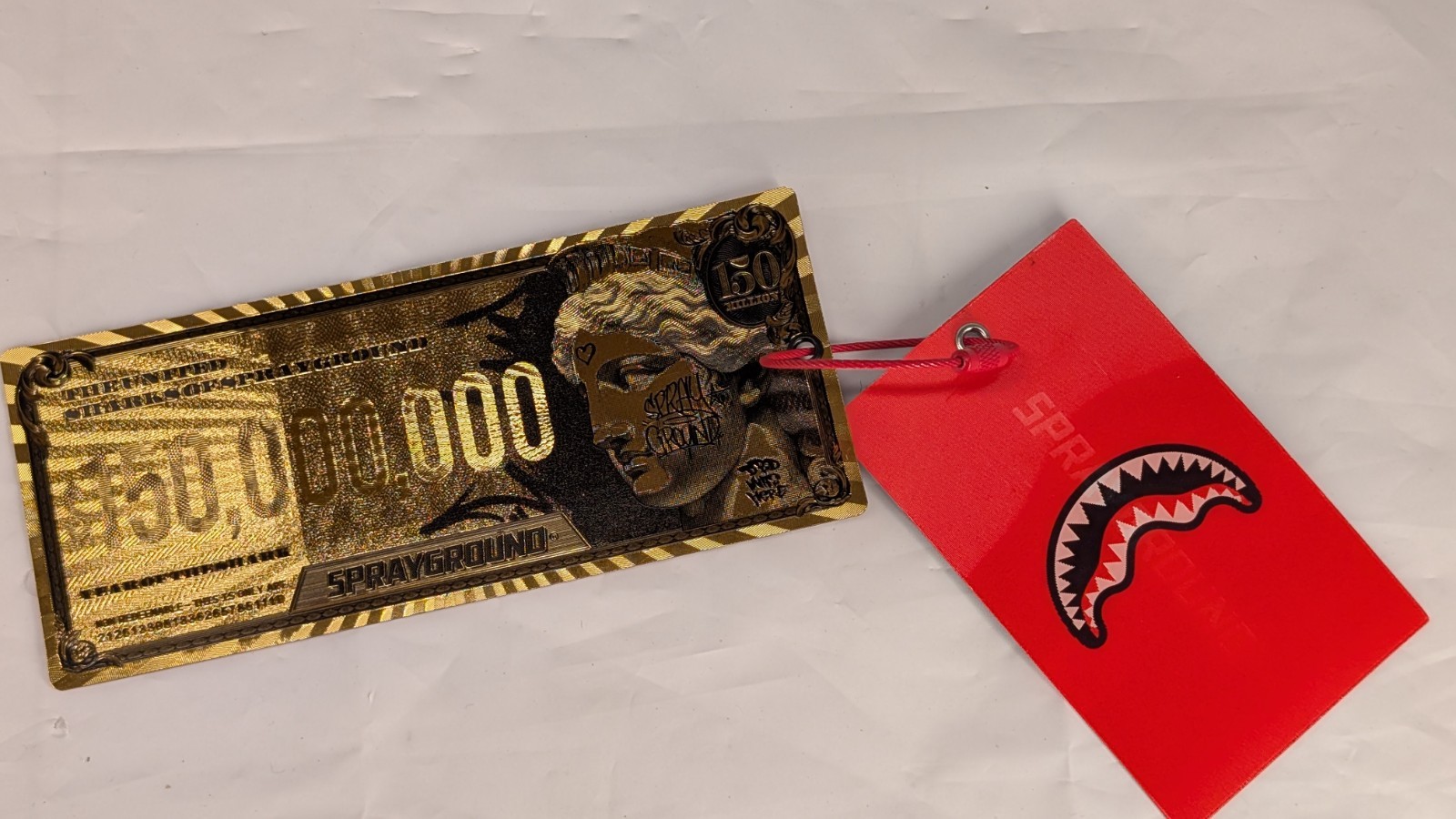 Limited Edition Sprayground $150 Million Year of the Shark Bill Tags Gold & Red