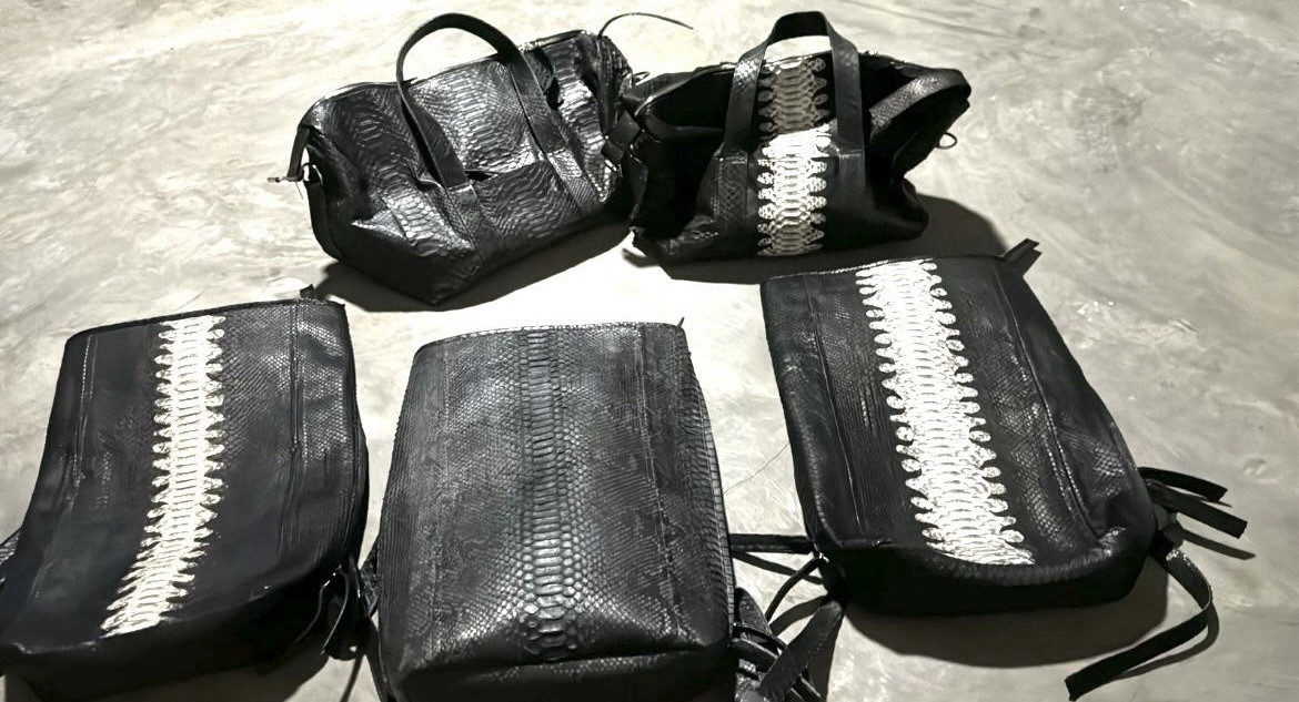 Cool and stylish Python Duffle Bag. 100% real python leather. Unisex.
