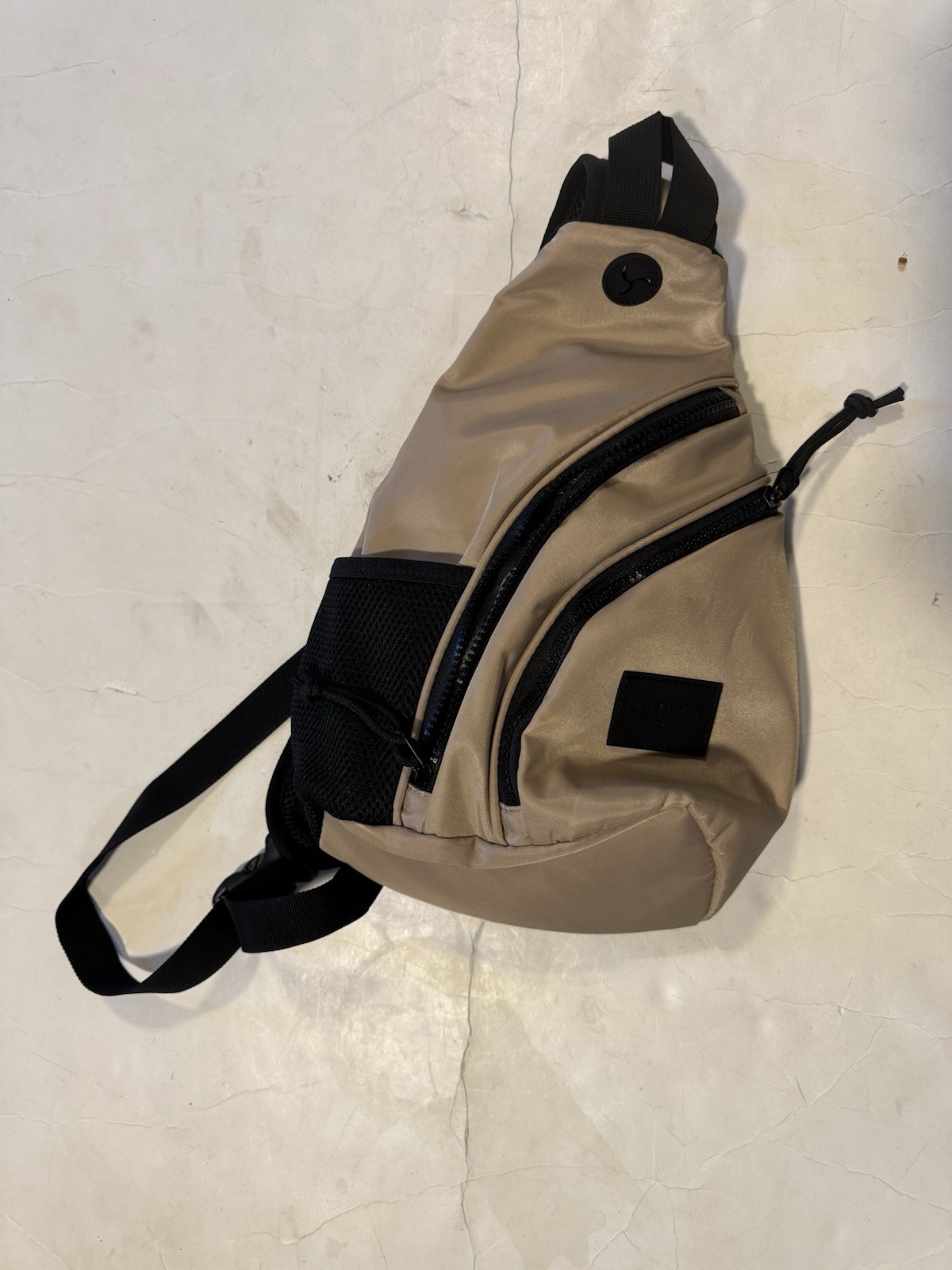 Duchamp London Sling Cross Shoulder Backpack 12×10.5 In. Khaki New!!!