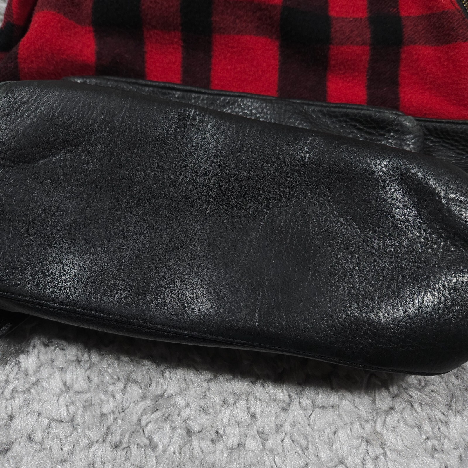 READ Mcq by Alexander Mcqueen Red Black Buffalo Plaid Wool Leather Backpack