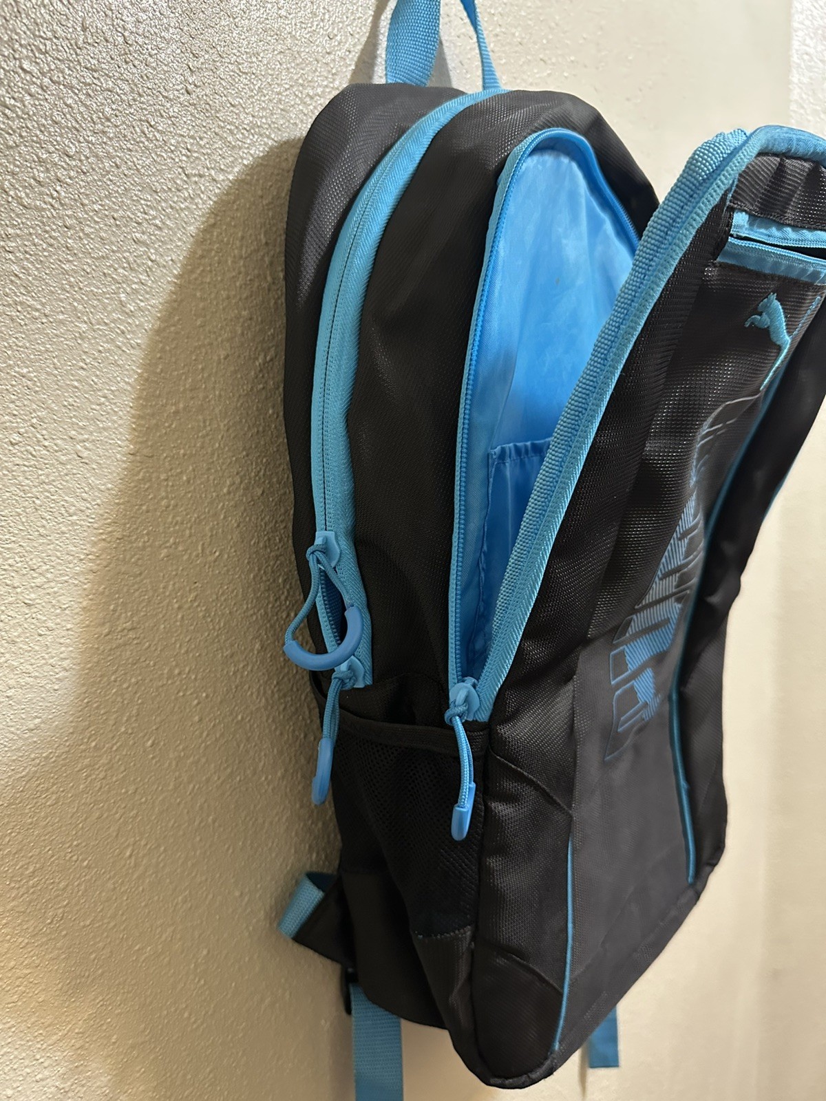 Puma Sweeper 2.0 Black/Blue Backpack for Men With Laptop Section