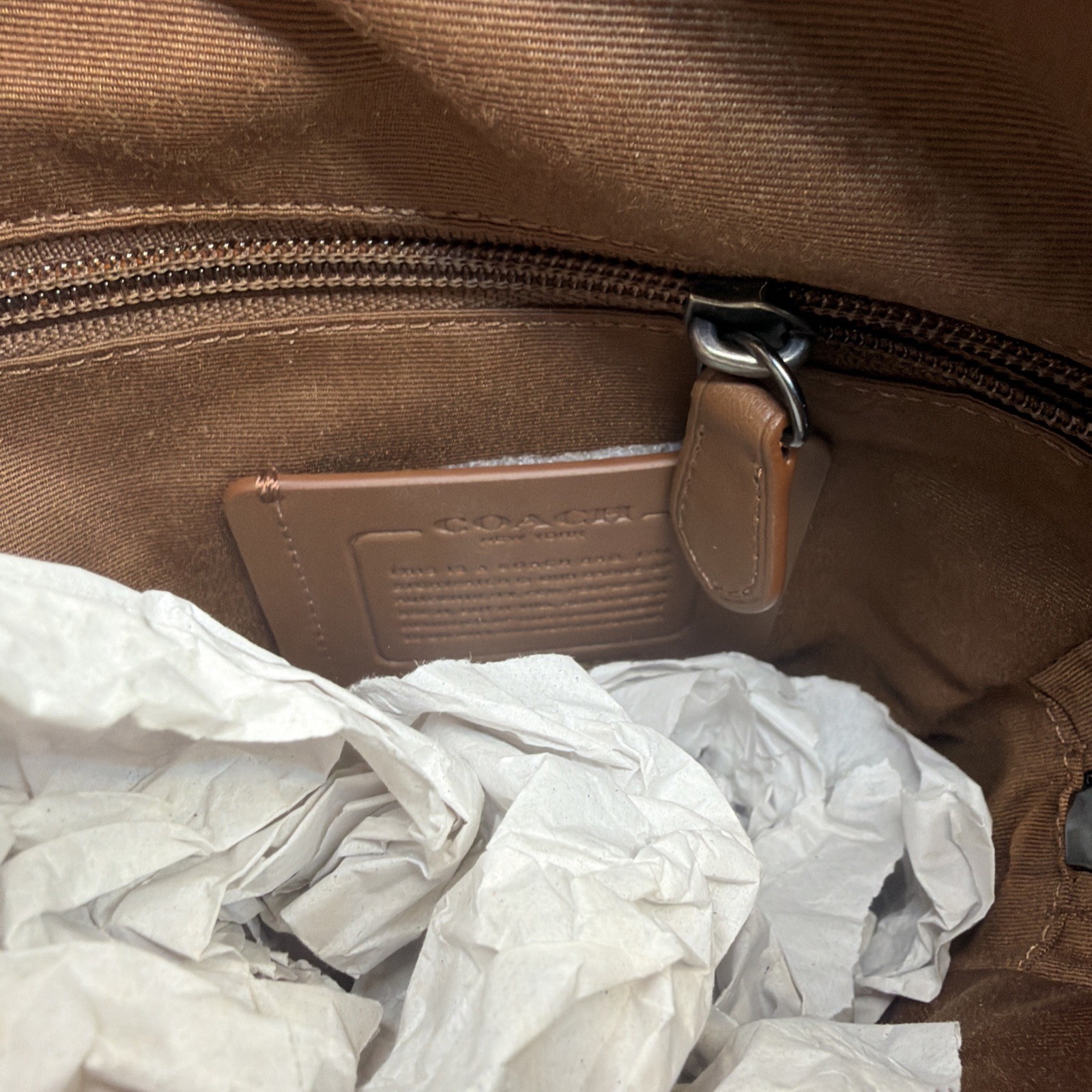 COACH Track Sling Backpack in Colorblock with Stamp in Red Ivory Orange