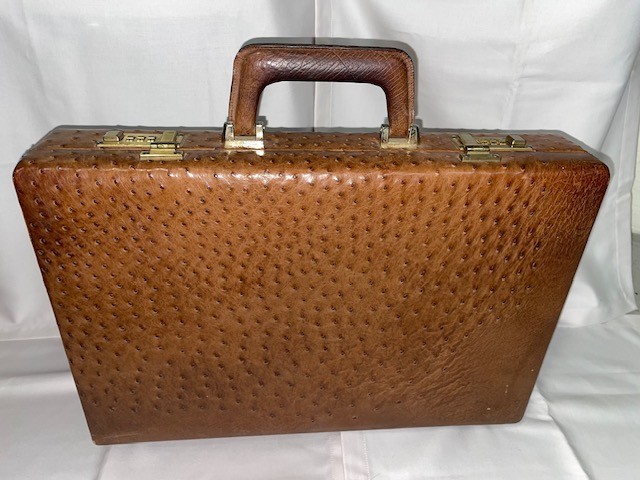 Ostrich briefcase. Brown. W 17 3/4″ X 12 1/4″ X 3 1/2″.
