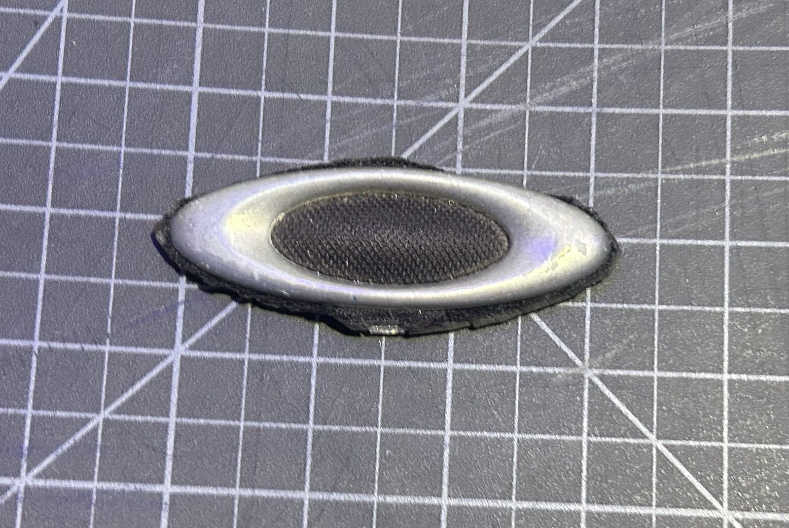Stainless Steel Oakley Icon Logo from ‘Icon’ Backpack