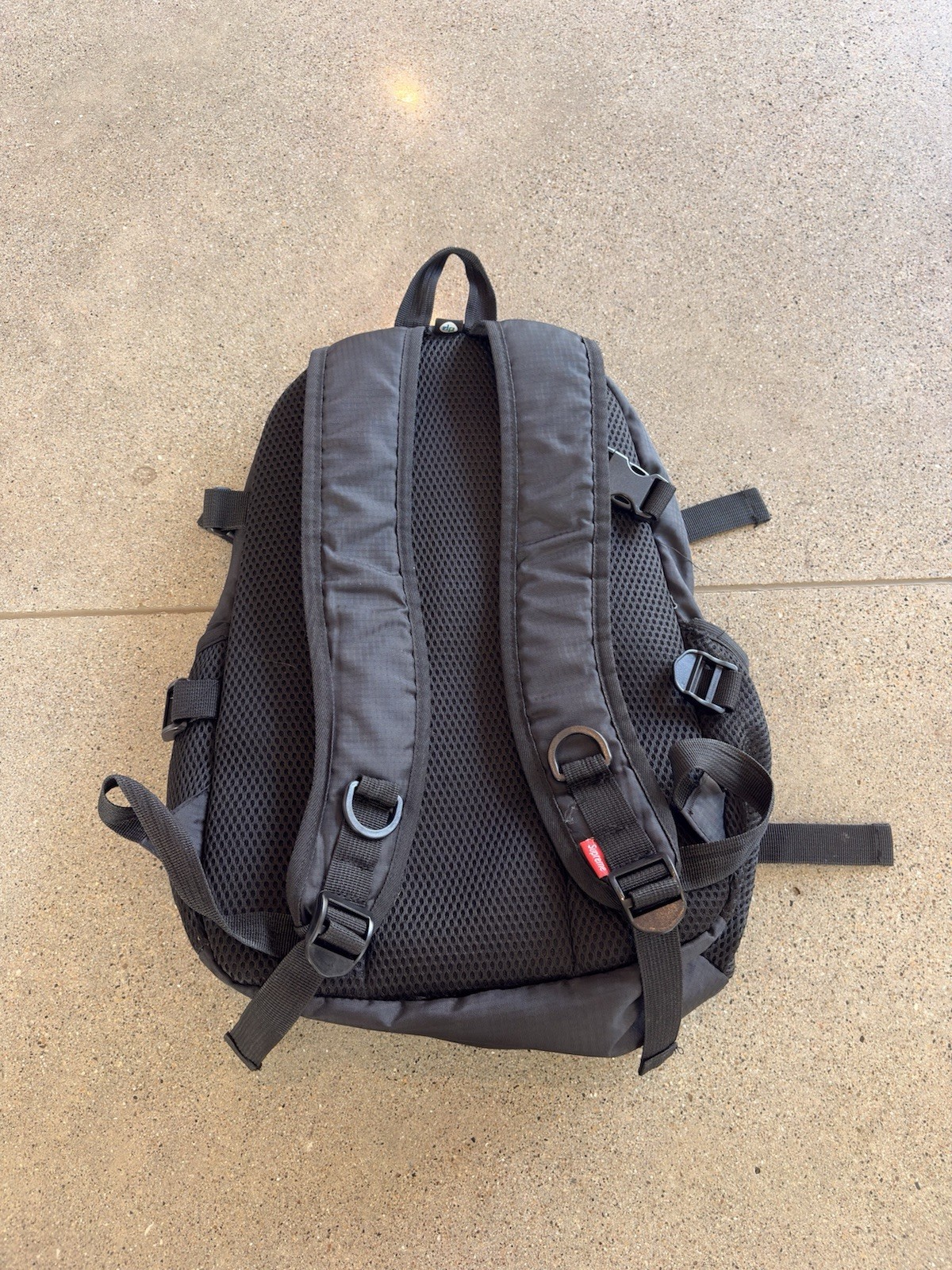 Supreme SS18 Reflective Backpack Black Spellout