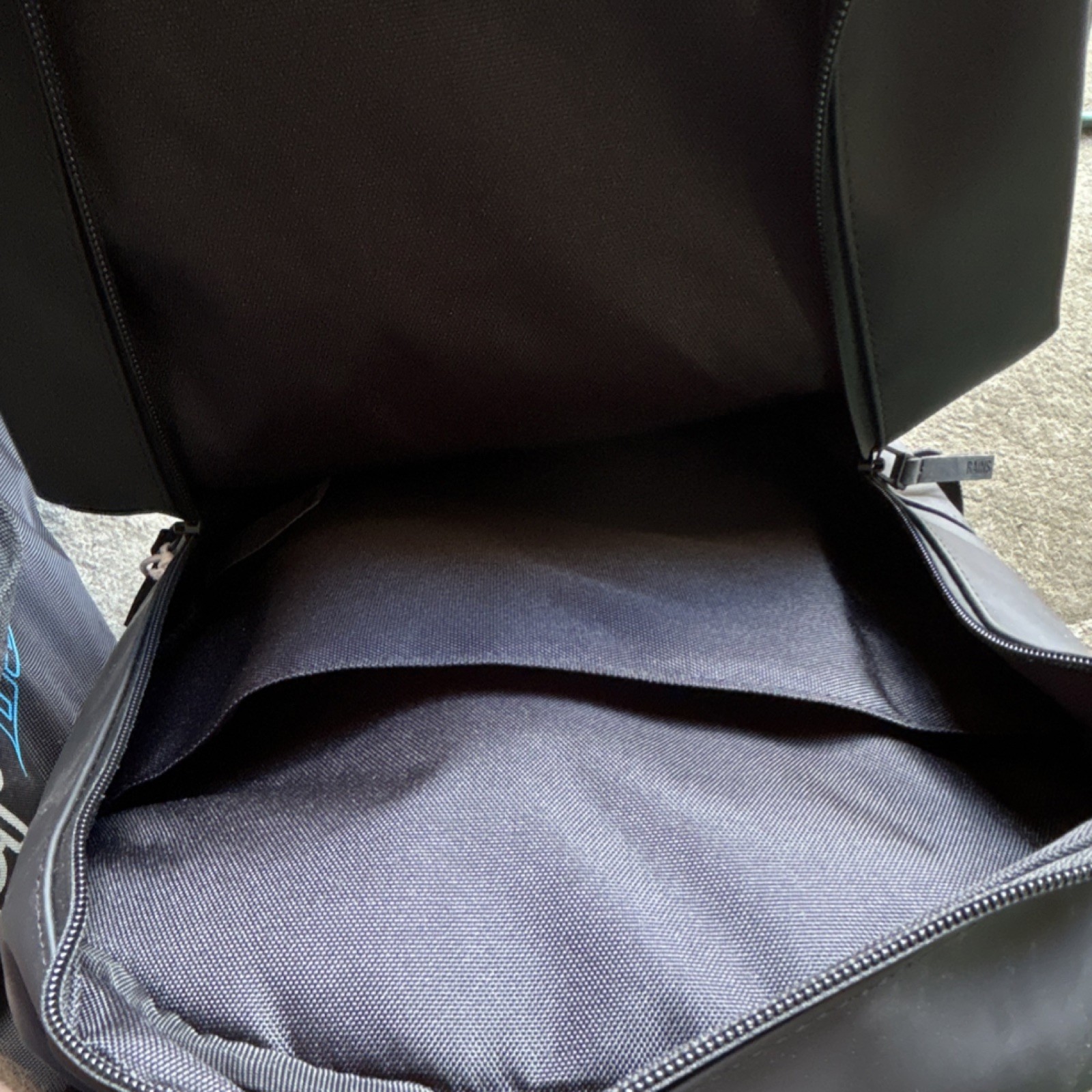 RAINS Black Polyurethane Backpack with Camel Patch Zip Closure for Men
