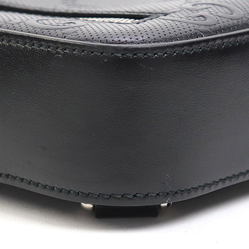 Gucci GG Embossed Sling Backpack Black Perforated Leather Crossbody Shoulder Bag