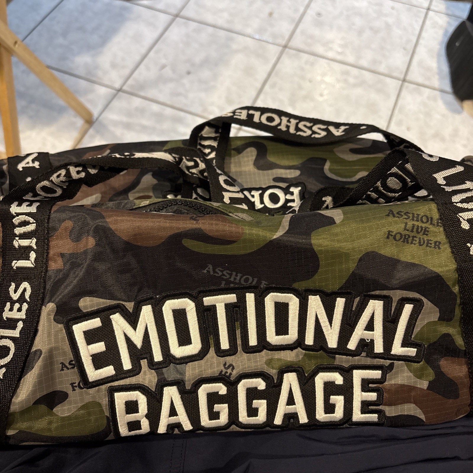 ASSHOLES*S LIVE FOREVER – Emotional Baggage Brown And Yellow Color –