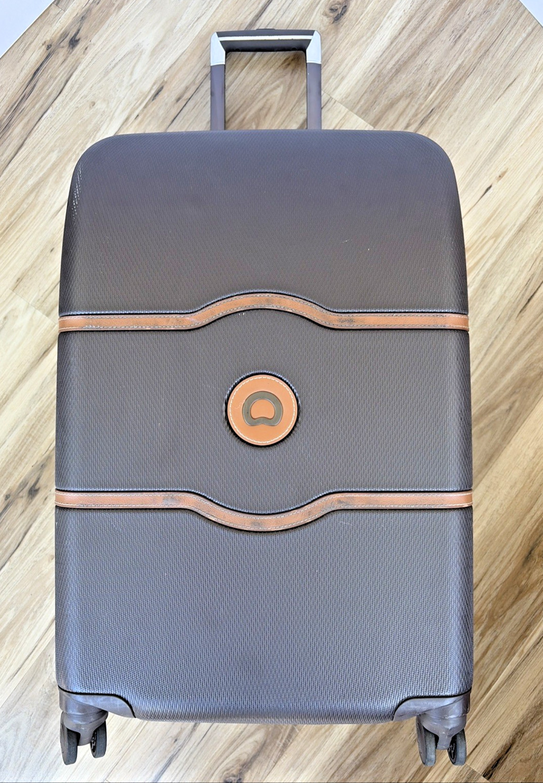 DELSEY Paris Chatelet Hardside Luggage 24” Inch 4 Spinner Wheels Suitcase Brown