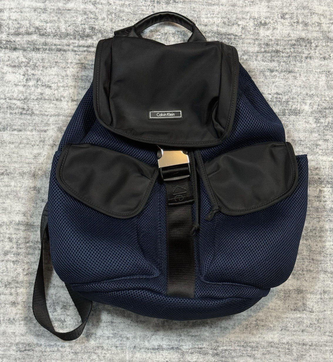 Calvin Klein Flap Top Flap Black/Blue Fabric Weave 18″ Backpack Pockets Logo