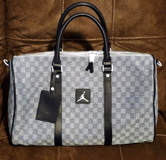Jordan Monogram Duffle Bag 23 print and Jumpman Logo Missing Shoulder Strap