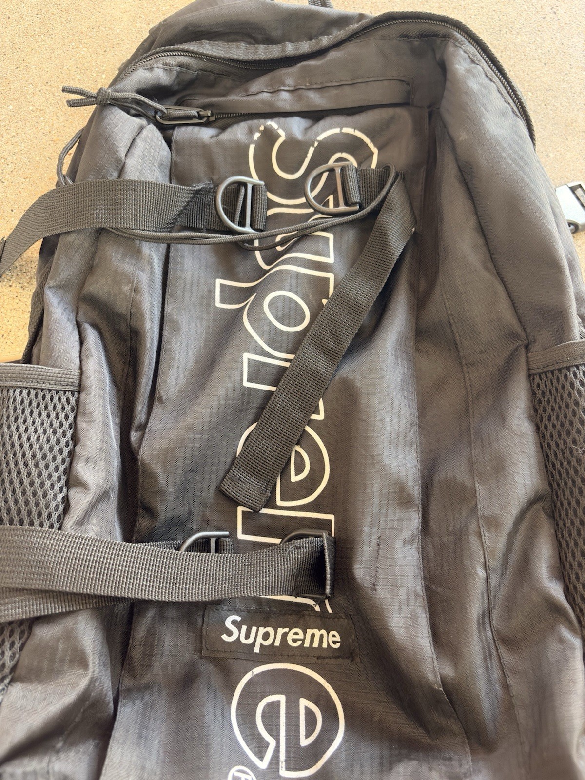 Supreme SS18 Reflective Backpack Black Spellout