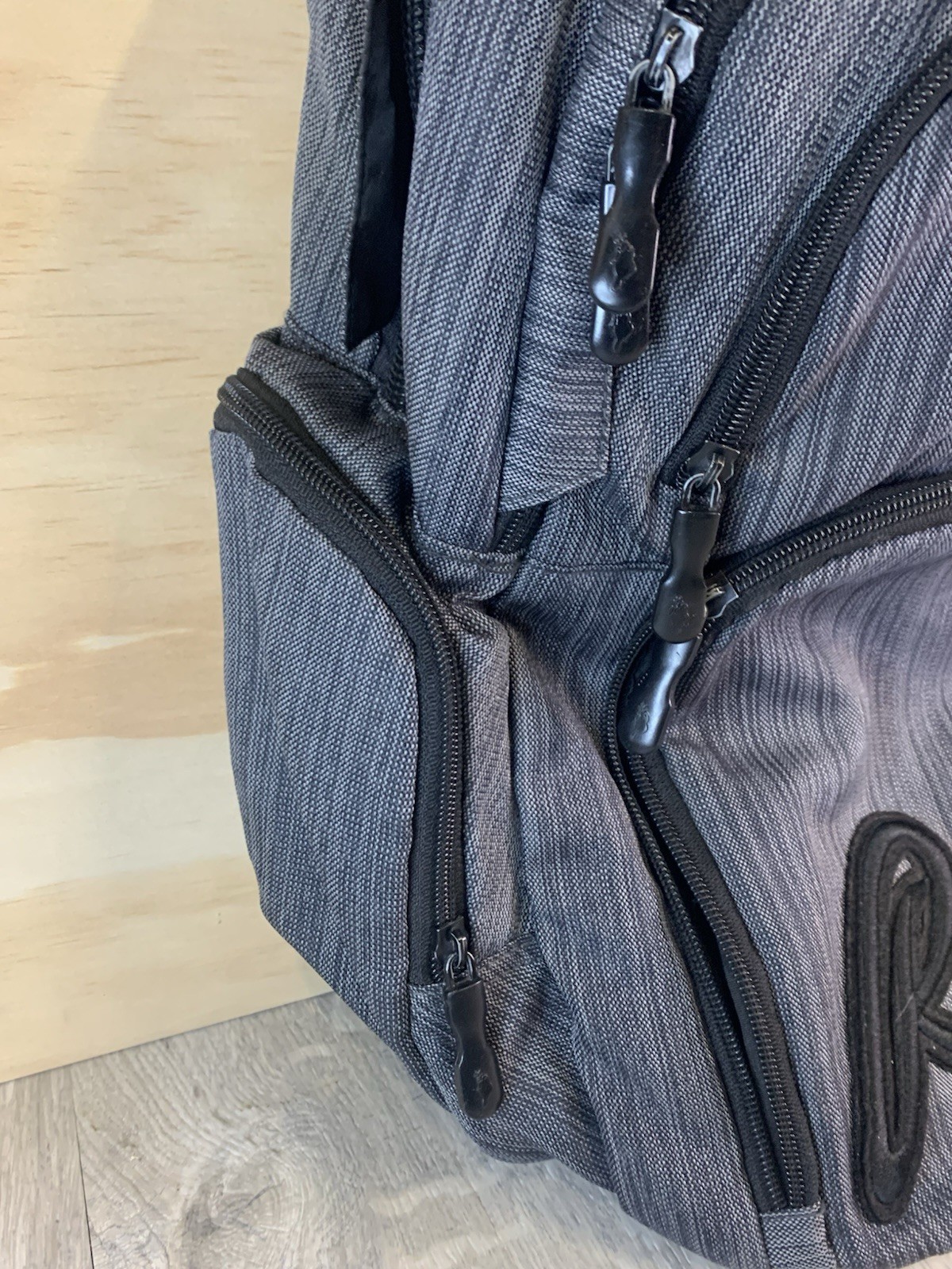 ROOTS Canada Gray/Black backpack, multi exterior zippered Pockets