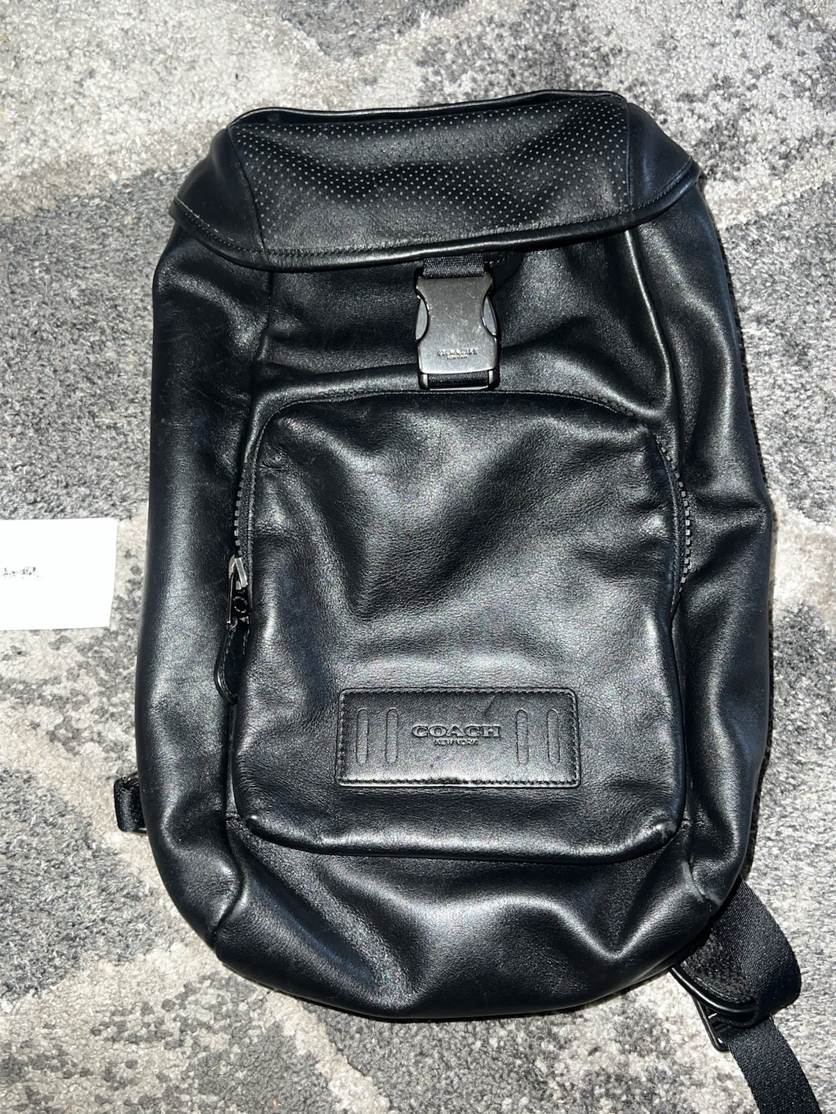 Coach Leather Sling Backpack well-organized, hands-free style, sleek design